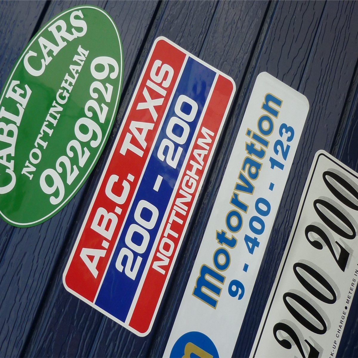 a selection of magnets used on taxis