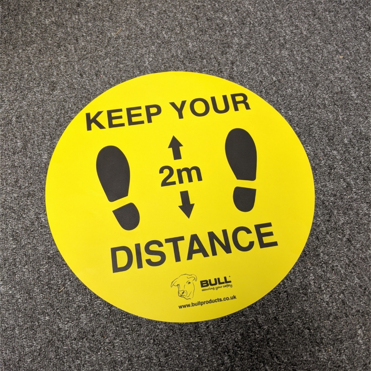 floor stickers used to tell people to leave 2m of space