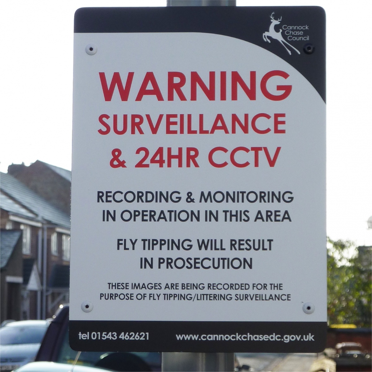 cctv sign mounted to lamppost