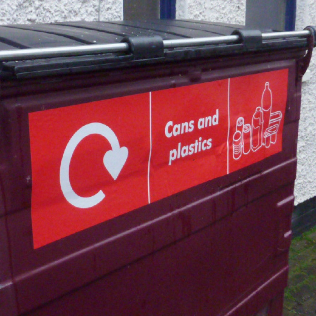 bold red sticker to advise the public what is accepted in that bin